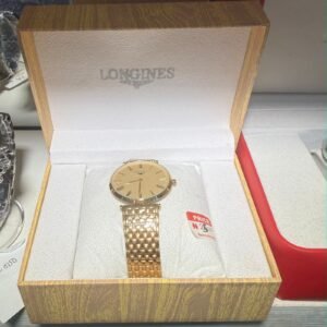 Luxury Longines gold watch in a wooden box